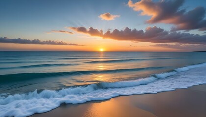 Obraz premium The sun dips below the horizon, casting a warm glow over the serene beach and ocean.
