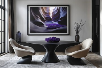 Black and white dining room with oval table, chairs, and framed photograph of purple flowers in Antelope Canyon.