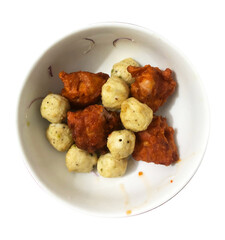 Fried chicken balls and chicken fry in a bowl