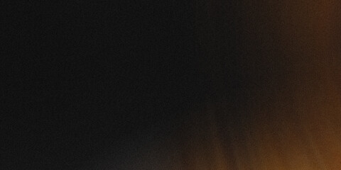 Abstract dark background with subtle brown and orange hues creating a blurred and soft gradient effect