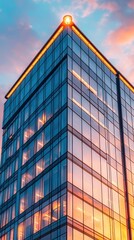 Modern glass skyscraper building with reflective illuminated by sunset, showcasing contemporary urban architecture and vibrant sky reflections at dusk