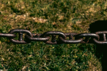 Photo of chain on stone