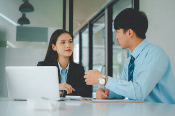 Fototapeta premium group of business people working and communicating together in the office With the charging of graphs for analysis, conceptual analysis and business planning