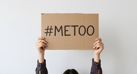 AI image showing hands holding up a simple brown cardboard sign with the hashtag #METOO written clearly in black marker.
