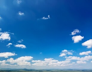 Fototapeta premium the sky is blue and clear with a few clouds scattered throughout