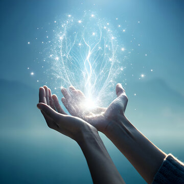 Hands Holding Sparkling Light