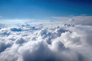Fototapeta premium Fluffy white clouds with soft blue sky background, bright natural lighting, ideal for weather, nature, travel, or relaxation themes.