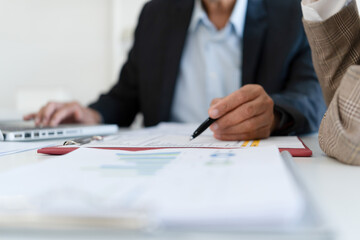 Senior businessmen analyzing data together.