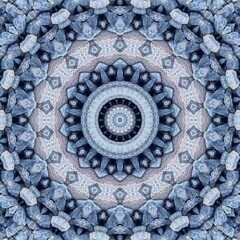 Intricate Blue Mandala with Layered Concentric Circles and Textured Patterns