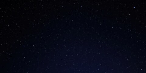Naklejka premium Night Sky Filled with Countless Sparkling Stars and Celestial Bodies