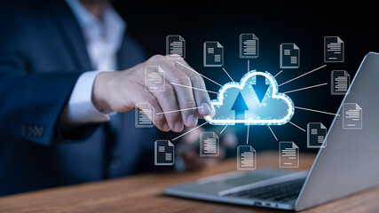 Businessman utilizing Cloud Computer technology and online storage for computer business network ideas linked to Internet server services for cloud transfer as demonstrated in the future Data Network.