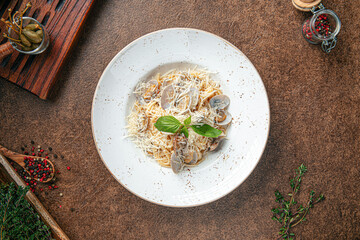 Portion of italian vongole pasta on white background