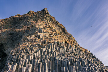 Reynisfjara black sand beach and basalt column mountain (South Iceland)