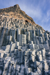Reynisfjara black sand beach and basalt column mountain (South Iceland)