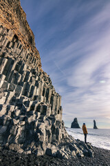Reynisfjara black sand beach and basalt column mountain (South Iceland)