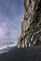 Reynisfjara black sand beach and basalt column mountain (South Iceland)
