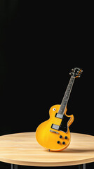 Vibrant yellow guitar resting on a rustic table ready for a music performance or creative inspiration at home