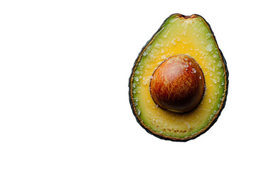 Ripe avocado half sprinkled with salt vibrant green and yellow hues against a light gray background