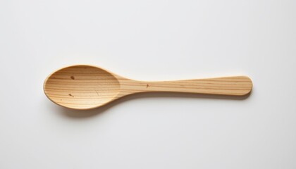 A biodegradable disposable wooden spoon laid flat and centered on a white background (RGB 255,255,255), showing its smooth light wood texture and curved spoon head