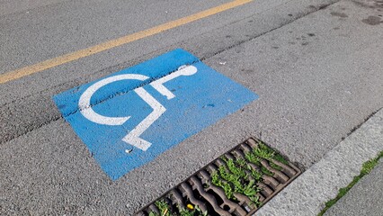 Accessible parking symbol in a carpark.