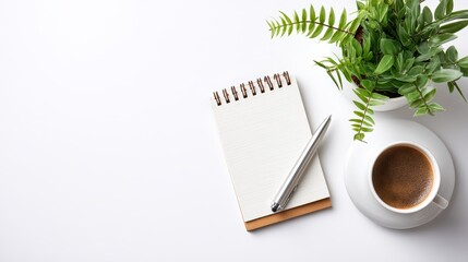 Cozy morning, coffee cup and notebook on a white table, setting the stage for productivity