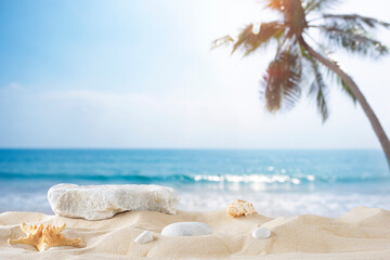 Sea shells and stone podium on beautiful blurred tropical summer sand beach background