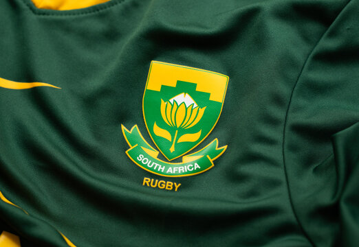 Kyiv, Ukraine, April 30, 2025. Close-up of South Africa national rugby team badge on green jersey fabric with yellow emblem and text.