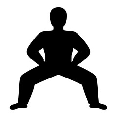 Silhouette of a person in a wide legged stance with hands on thighs