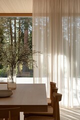 Enjoy stunning forest views from a serene dining space.