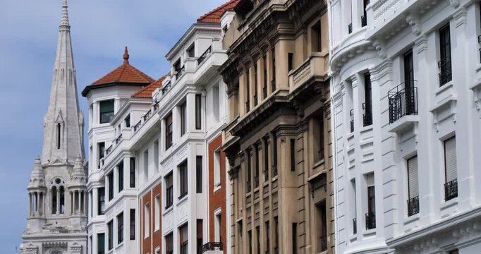 Traditional facades and church San Jose de la Montana, Bilbao, Basque country, Spain