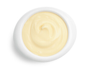 Tasty vanilla pudding in bowl isolated on white, top view