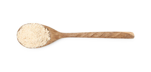 Superfood product. Sesame seeds powder in spoon isolated on white, top view