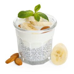 Delicious dessert with chia seeds, yogurt, banana, almond and mint in glass on white background....