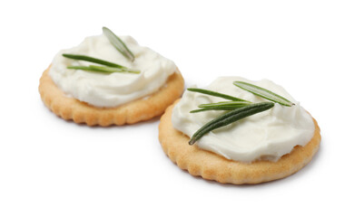 Tasty crackers with cream cheese and rosemary isolated on white