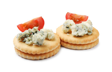 Tasty crackers with blue cheese and tomatoes isolated on white