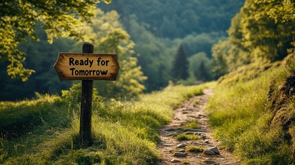 Rustic wooden sign on a path, encouraging anticipation for tomorrow.  Sunlit pathway through verdant forest