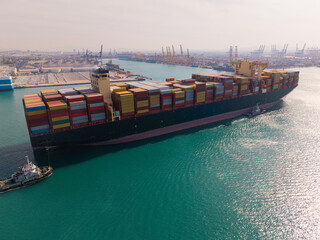 Large cargo ship transporting colorful containers across ocean