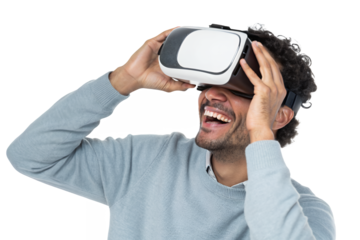 A smiling man with curly hair looks up, wearing a virtual reality headset against a transparent background
