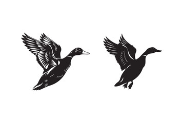 Two Black and White Silhouettes of Ducks in Flight