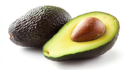 A fresh avocado, halved to reveal the creamy green flesh and large seed, with a natural shadow on white.
