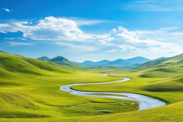 Mountain valley with vivid green fields and flowing river