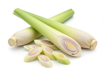 Fresh lemongrass stalks and slices arranged on a white background for culinary use