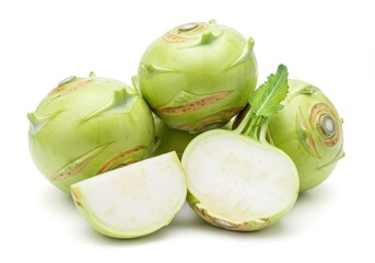 Naklejka premium Pile of fresh kohlrabi bulbs with one cut in half and a slice on white
