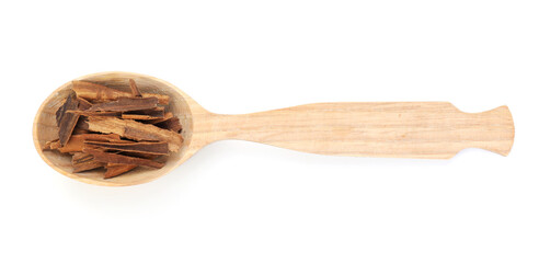 Aromatic cinnamon in wooden spoon isolated on white, top view