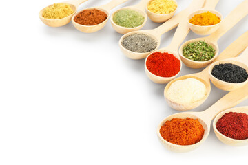 Different aromatic spices in spoons isolated on white