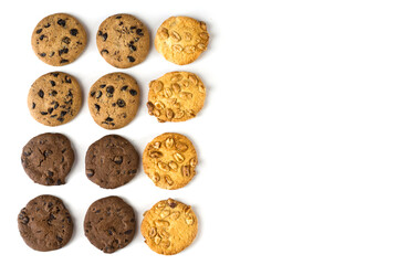 Set of different round cookies on white background with copy space, place for text.