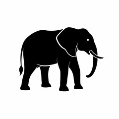 Obraz premium Silhouette of a black elephant with tusks and trunk raised