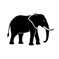 Obraz premium Silhouette of a black elephant with tusks and trunk raised