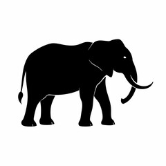 Obraz premium Silhouette of a black elephant with tusks and trunk raised