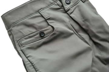 Stylish gray pants with unique wave texture detail close up view showing fabric and button